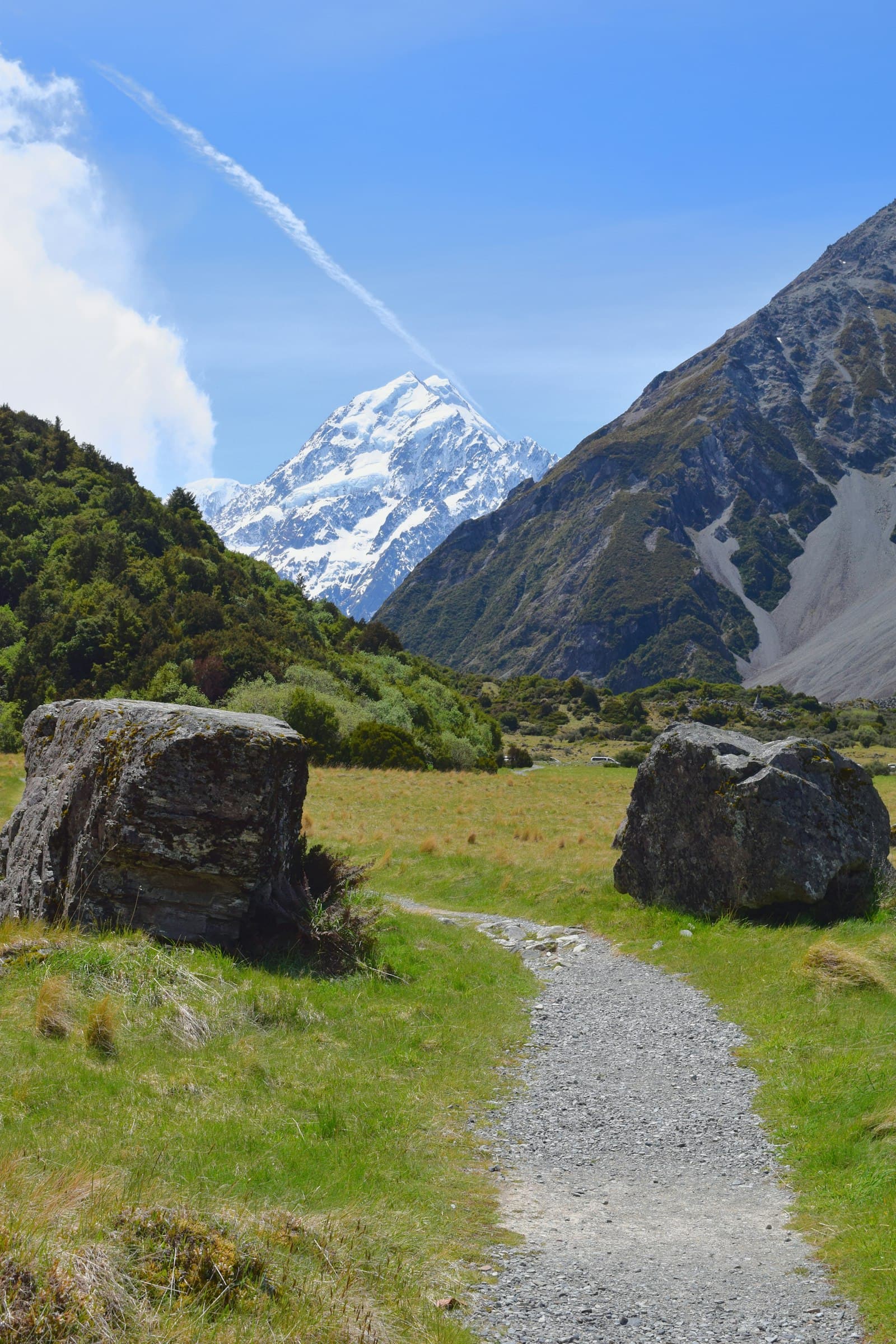 A gravel path toward the snow-covered peak of Aoraki / Mount Cook